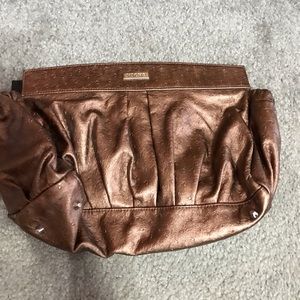 Copper colored Miche purse cover